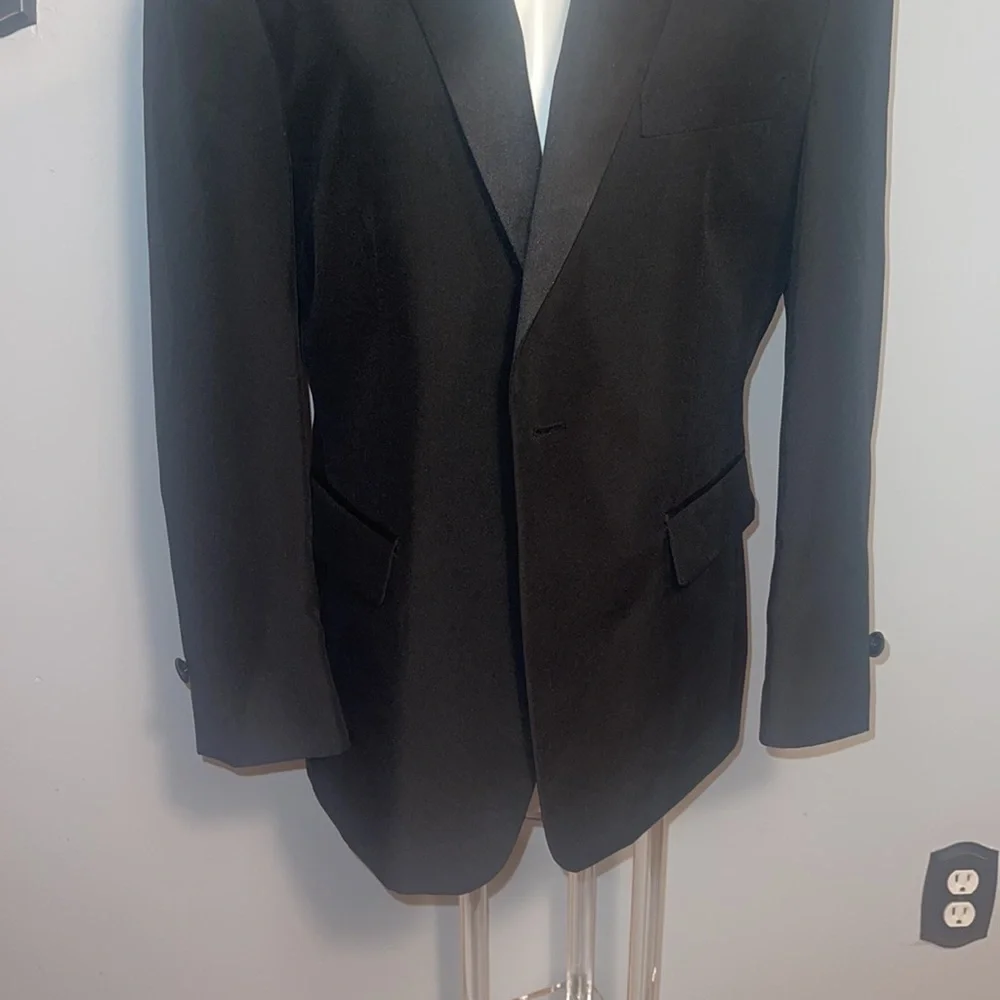 Formal Fashions men’s black tuxedo jacket and pants. Jacket 38S, Pants 34x34